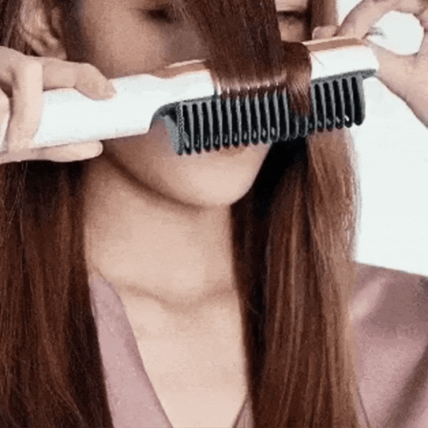 Peigne lisseur portatif